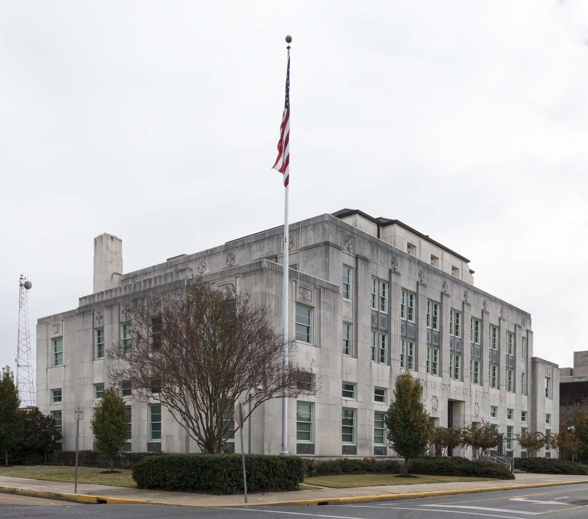 Exterior of Bibliotheca Alexandrina showing distinctive tilted disc architecture against Mediterranean Sea