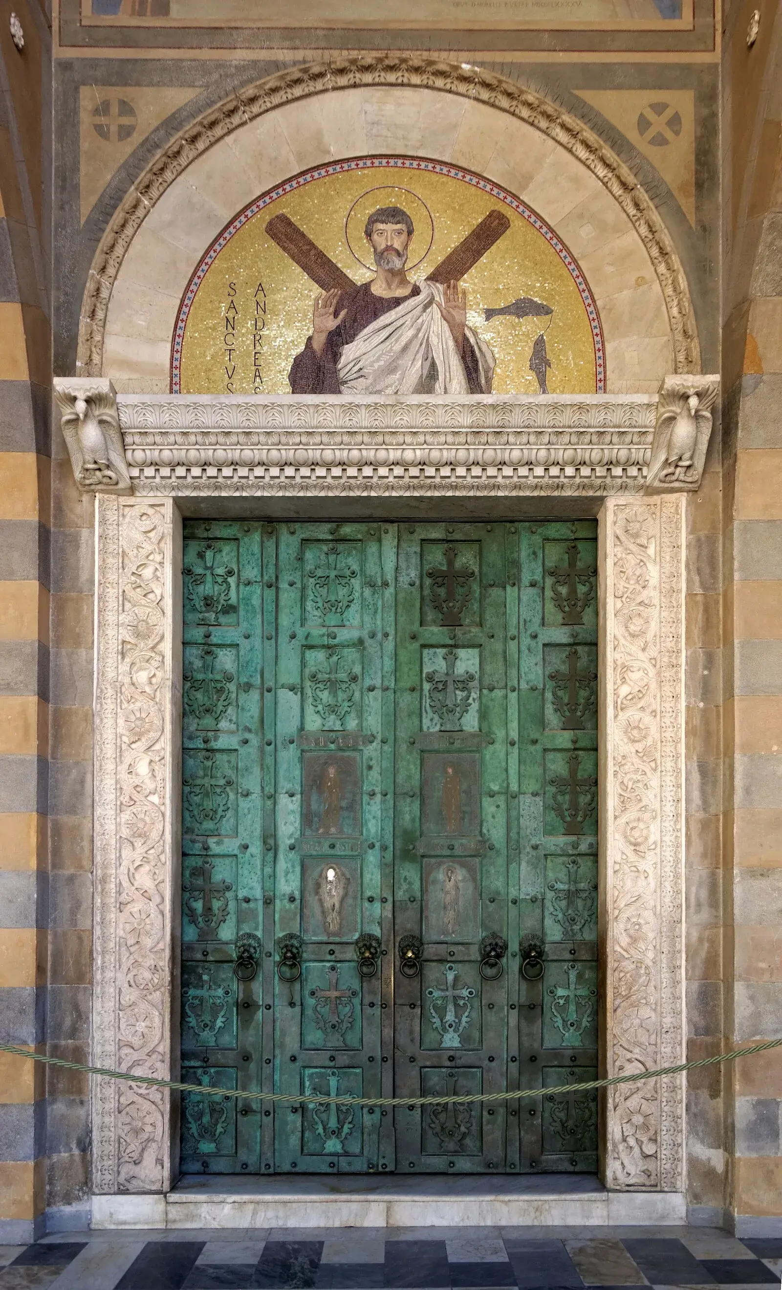 Bronze doors of Amalfi Cathedral with Saint Andrew mosaic above