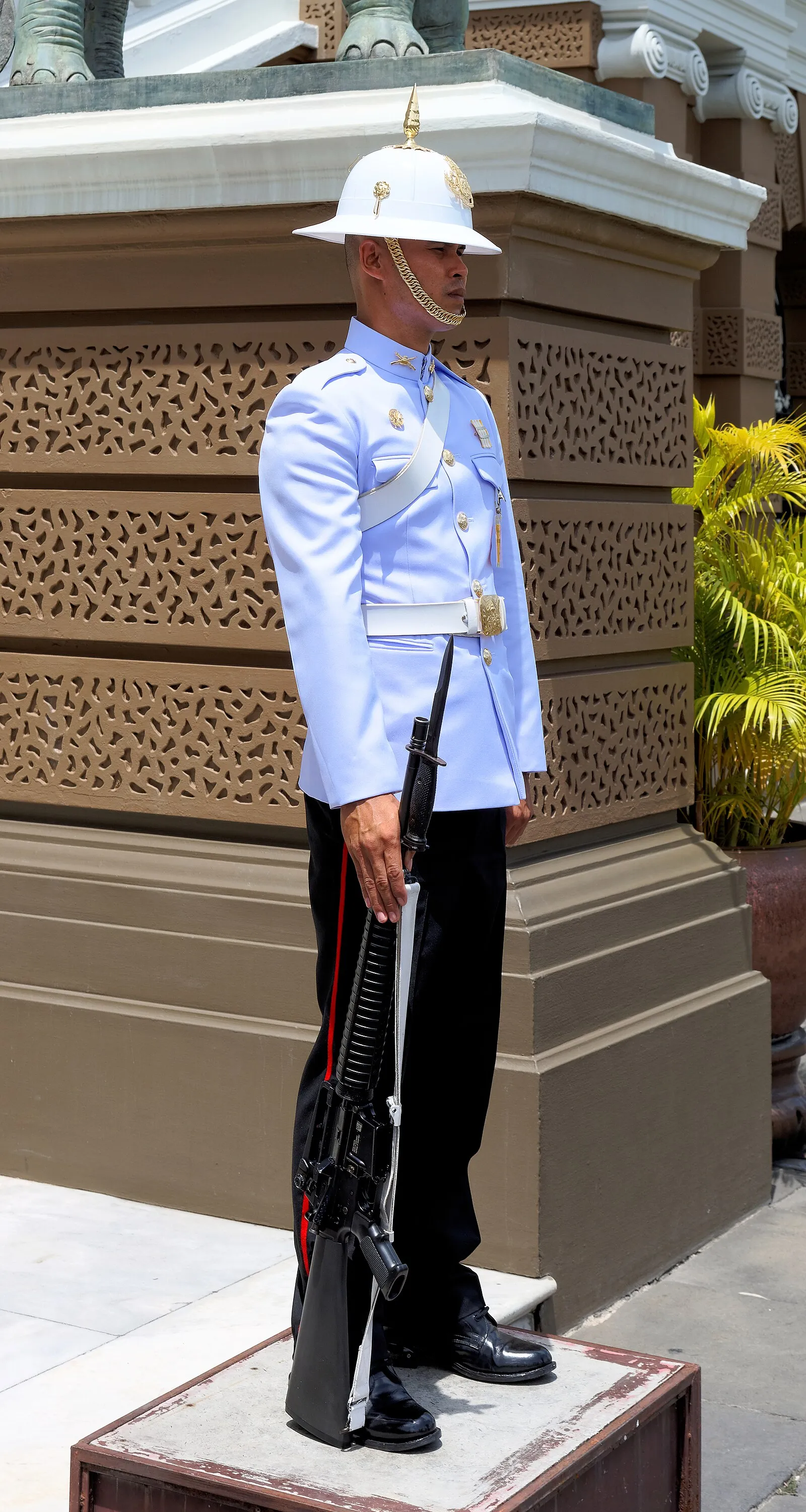 Royal Thai Guard sentry in ceremonial uniform at the Grand Palace, Bangkok