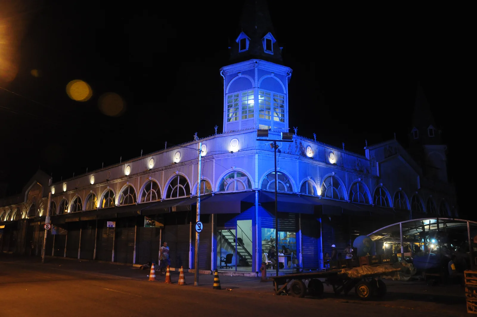 The Mercado de Peixe at Ver-o-Peso in Belém, its ironwork and turrets floodlit against a night sky