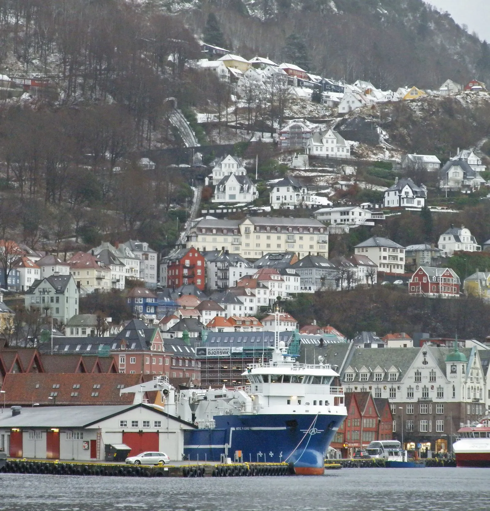 Medieval stone walls of Bergenhus Fortress overlooking Bergen harbor