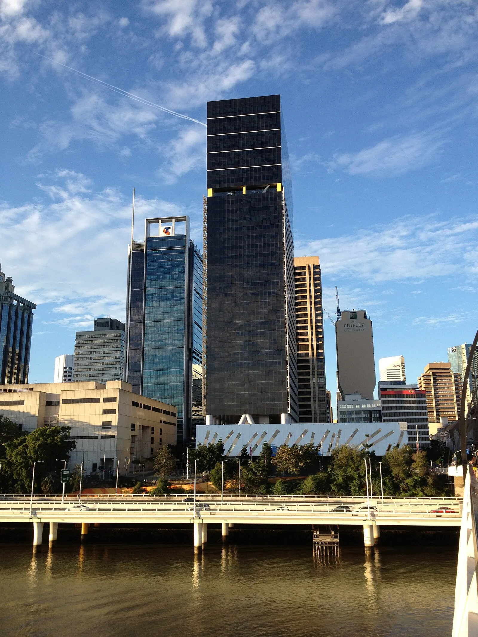 South Bank parklands with Brisbane city skyline and river in background