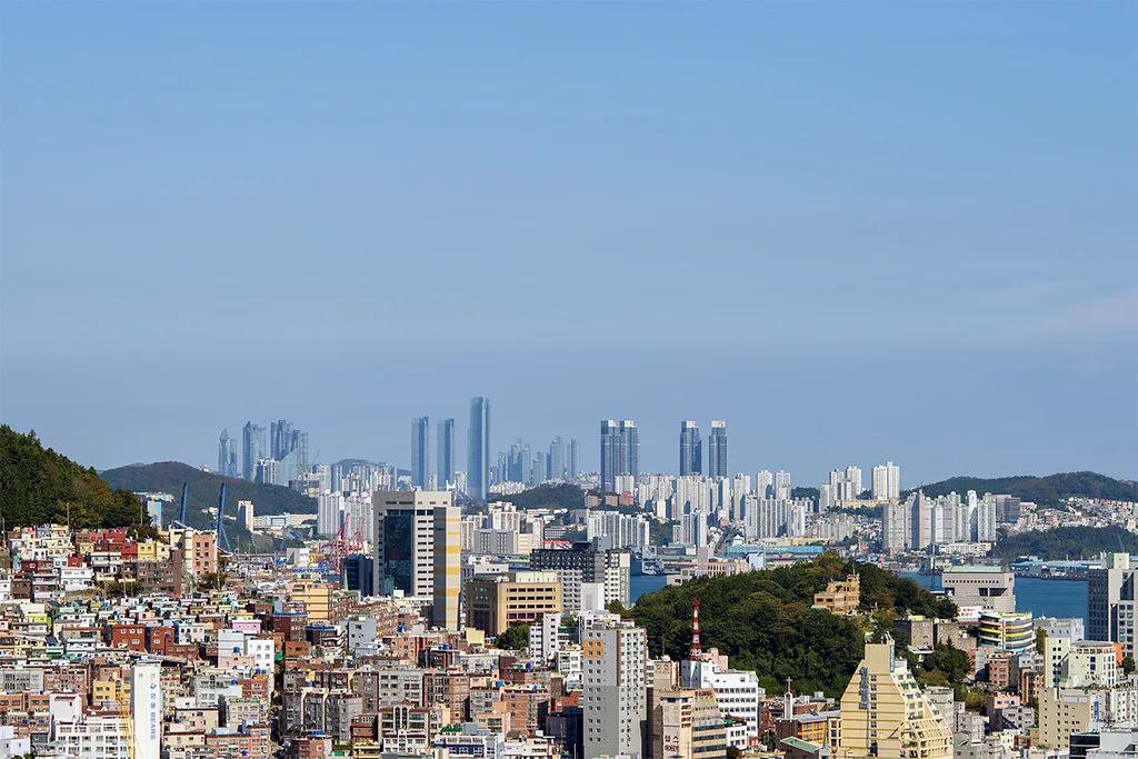 Panoramic view of Haeundae Beach and high-rise skyline in Busan