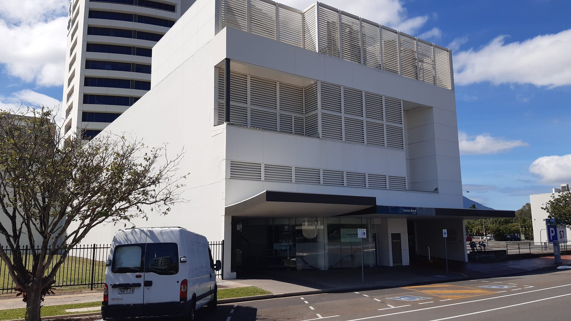 Fresh barramundi fish and chips with lemon at a Cairns waterfront restaurant