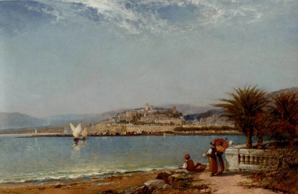 19th century painting of Cannes viewed from across the bay showing Le Suquet hilltop and sailing ship