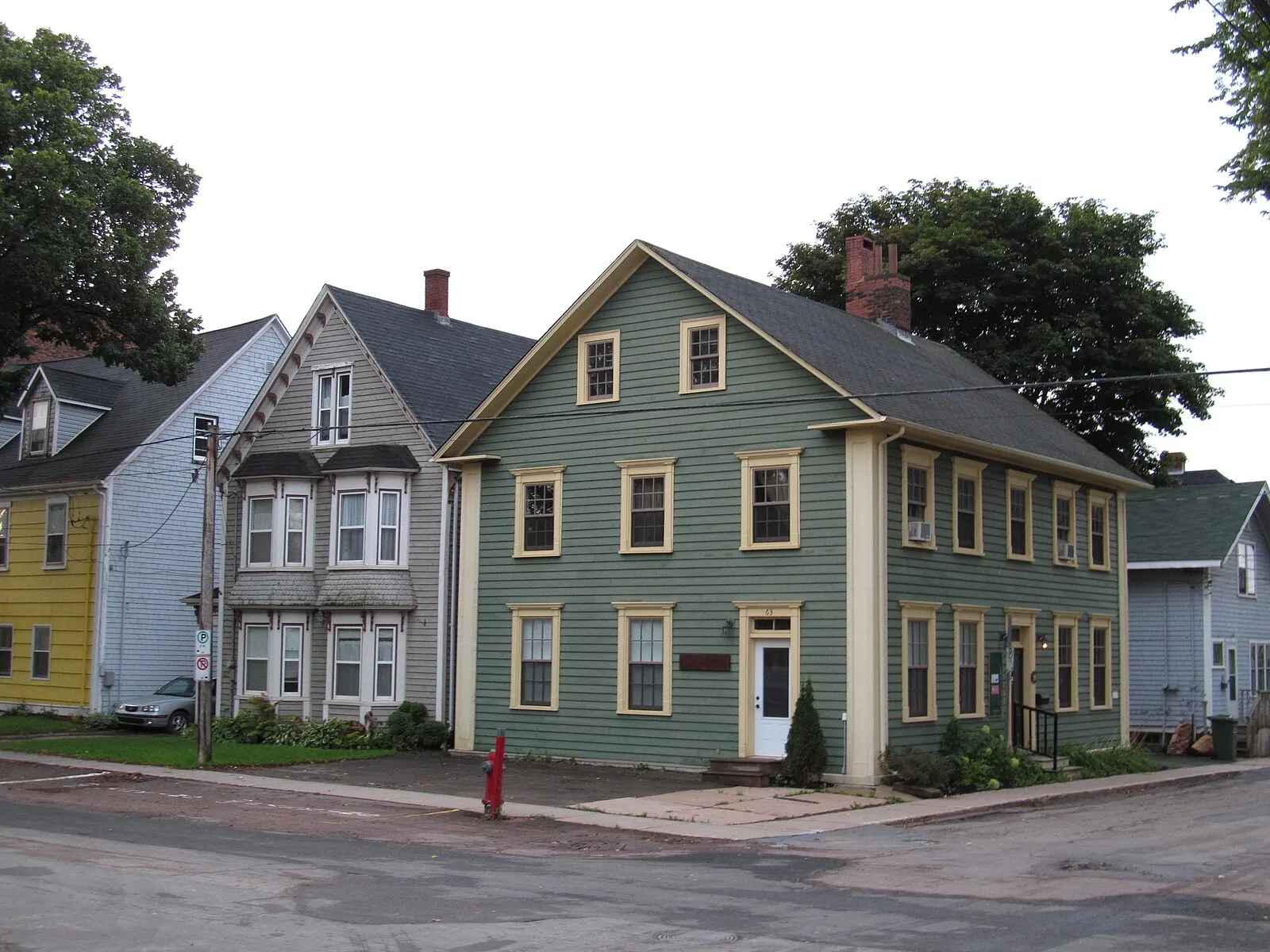 PEI red sand beach with rusty cliffs and blue water