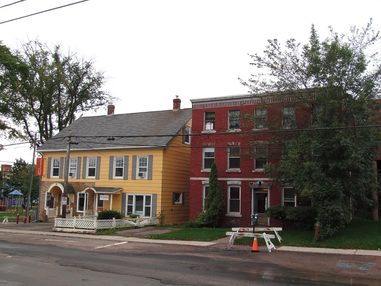 Green Gables historic farmhouse with white shutters and green trim