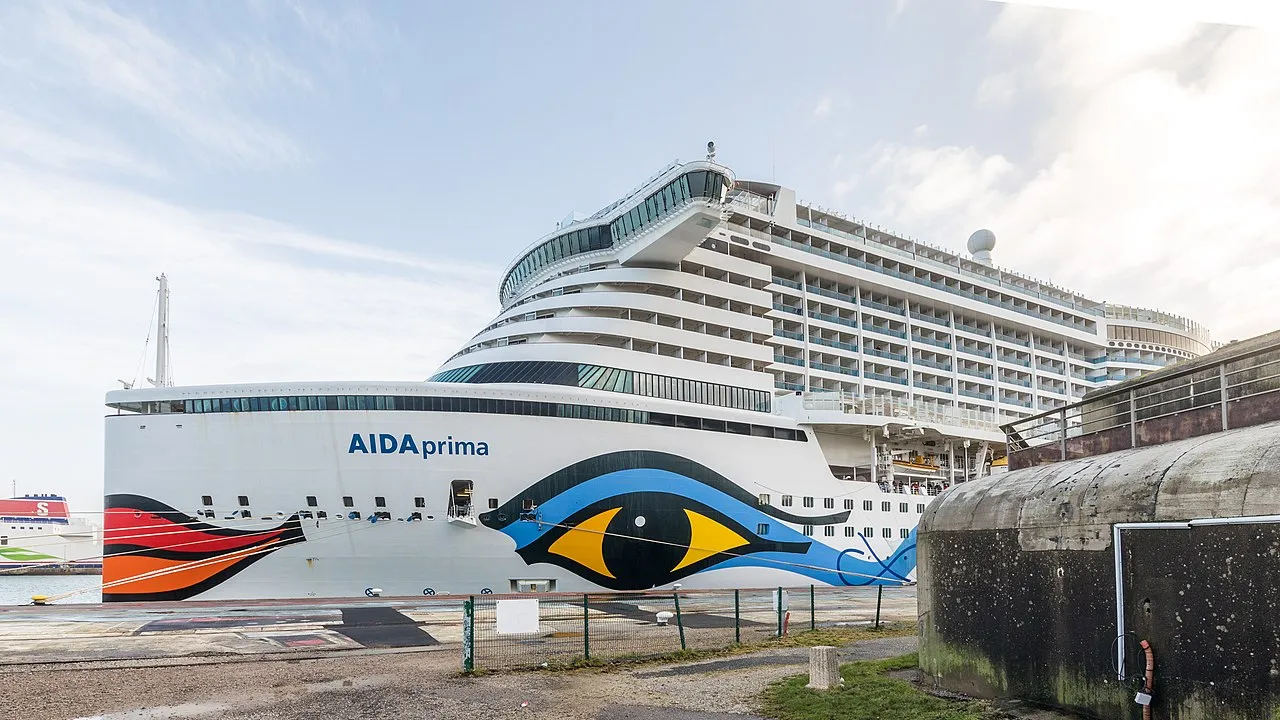 Cherbourg harbor with the Art Deco Cité de la Mer transatlantic terminal and French flag flying