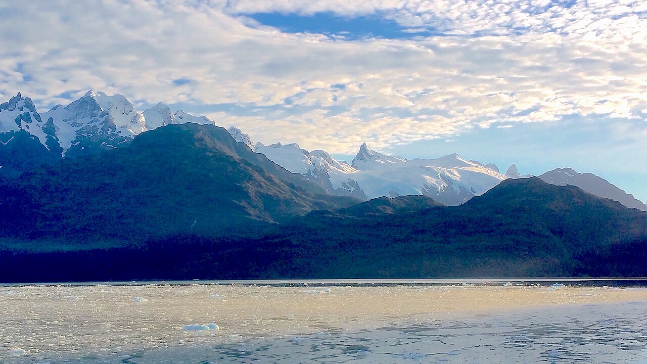 Passengers viewing scenery from the ship deck during Chilean fjords transit