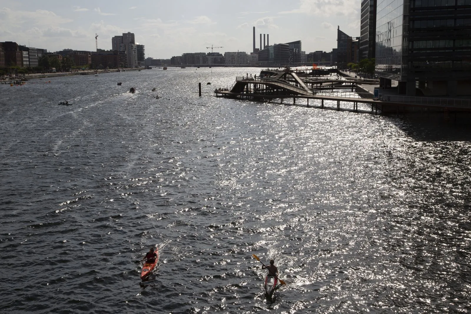 Tivoli Gardens illuminated at night with fairy lights and rides