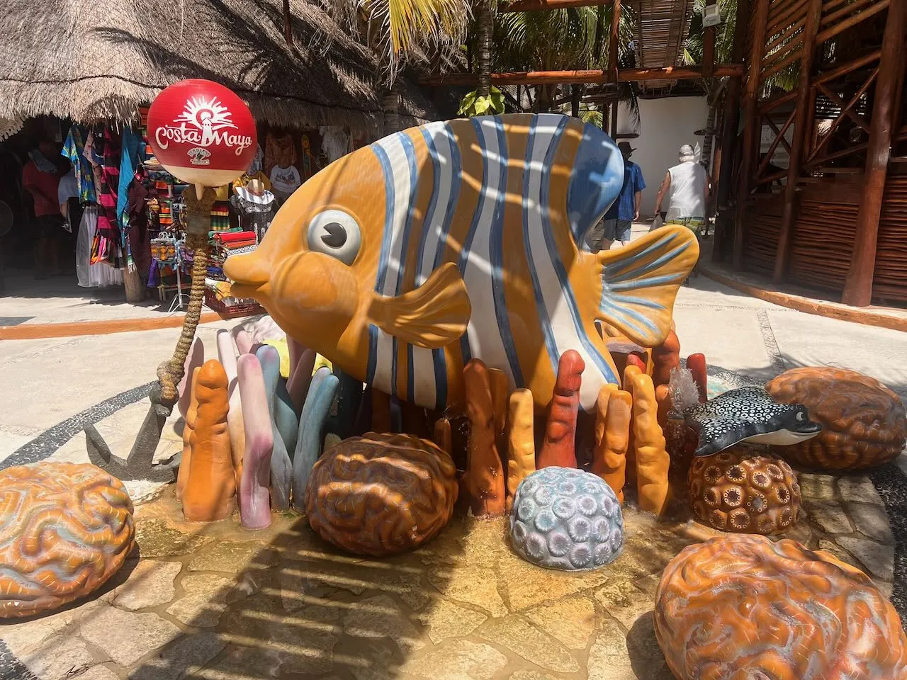 Whimsical fish sculpture art installation at Costa Maya port