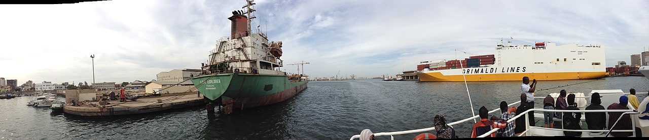 African Renaissance Monument towering over Dakar with the Atlantic Ocean stretching to the horizon beyond Senegal's capital