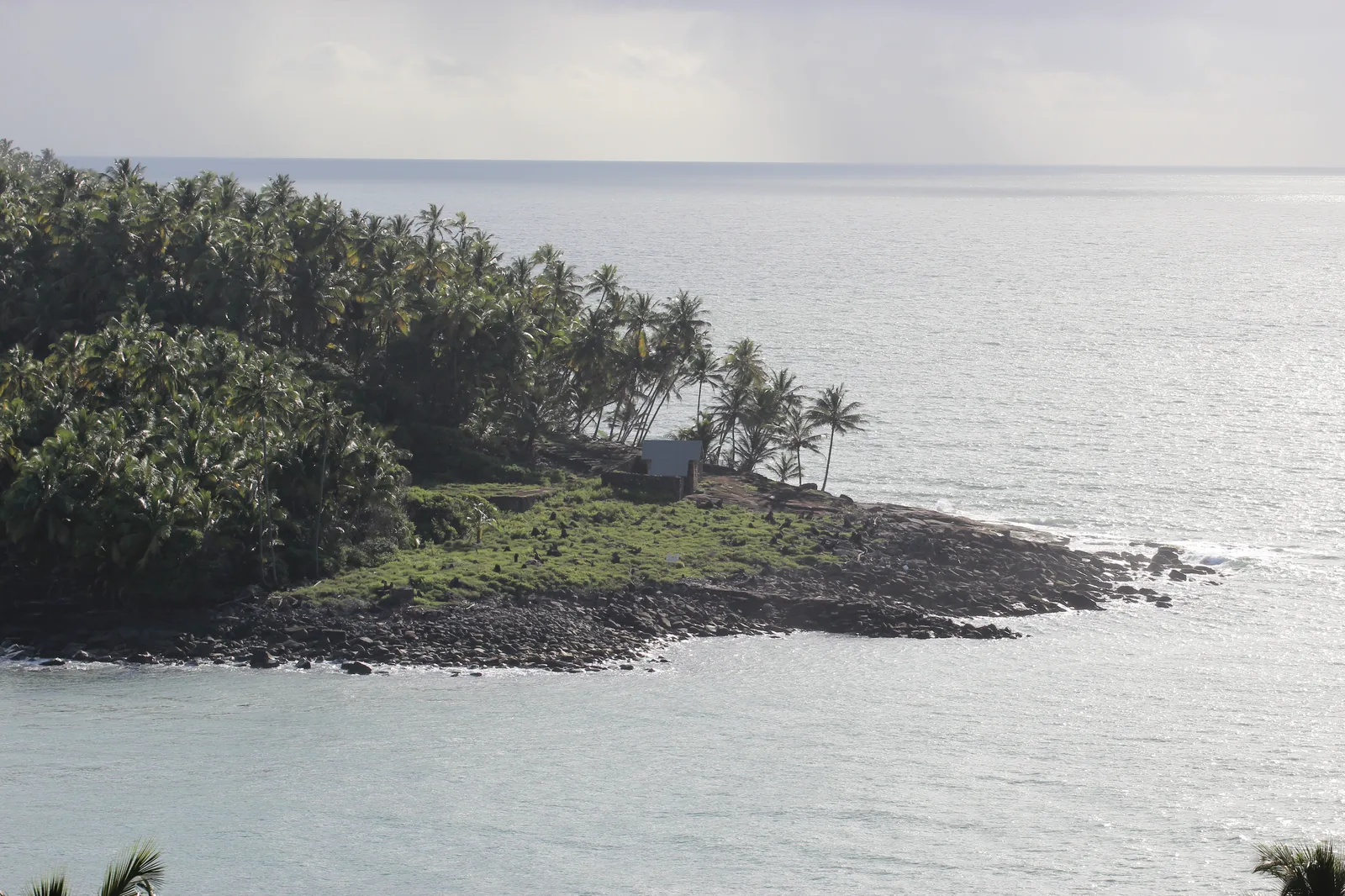 Alfred Dreyfus's small stone hut on Île du Diable, seen across the water from Île Royale