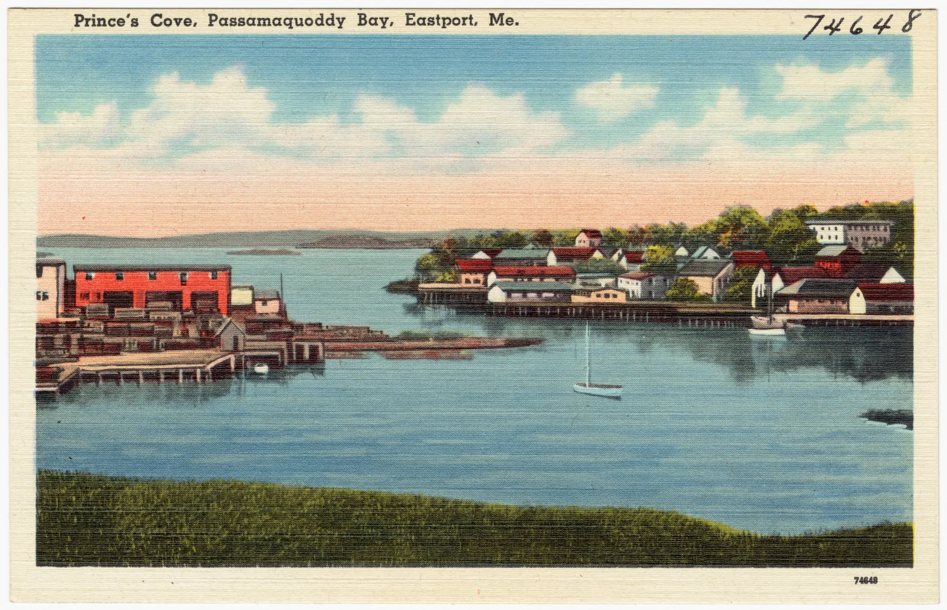A vintage linen postcard of Prince's Cove at Eastport, showing red waterfront fish buildings on pilings, a sailboat on blue water, and the town beyond
