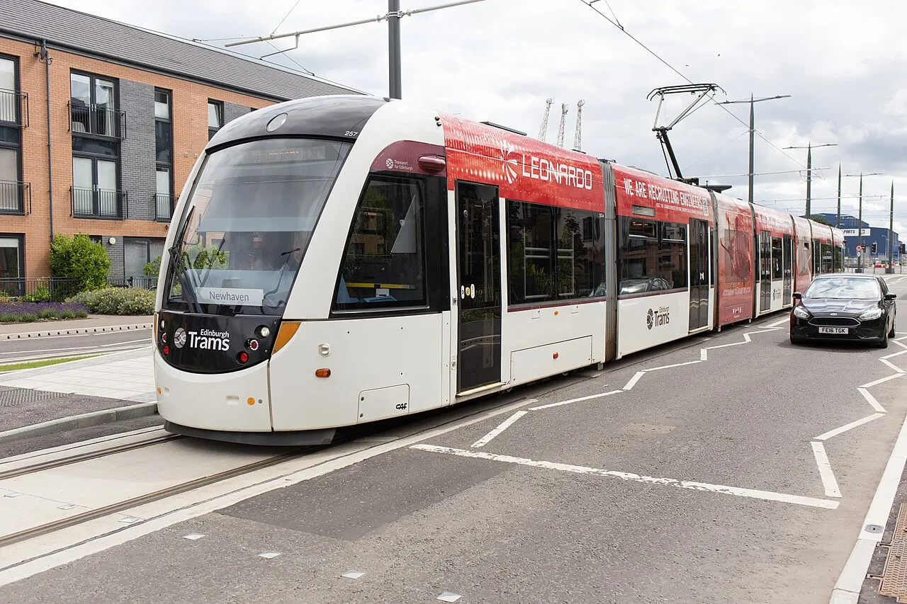 Edinburgh Trams vehicle at the Newhaven extension near the cruise port, branded Edinburgh Trams