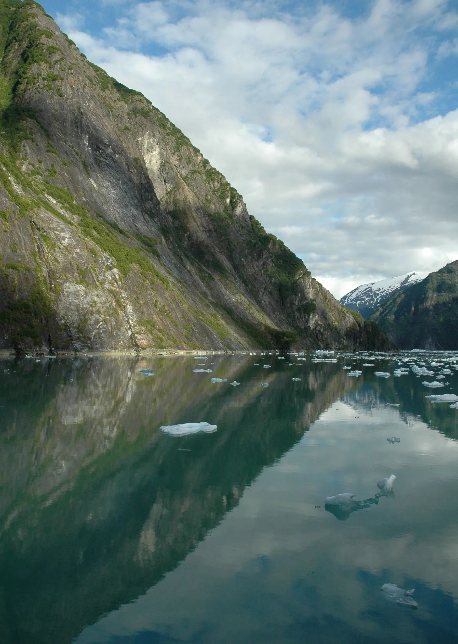 Dawes Glacier calving event sending ice crashing into water