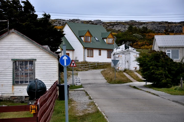 Street scene in Stanley Falkland Islands with traditional houses and British telephone box