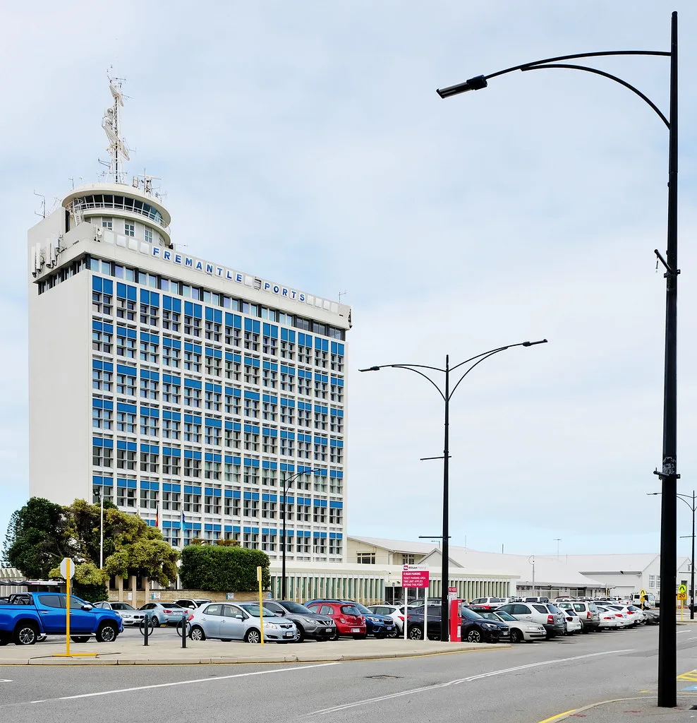 Inside the Fremantle Markets Victorian hall with produce stalls and crowds