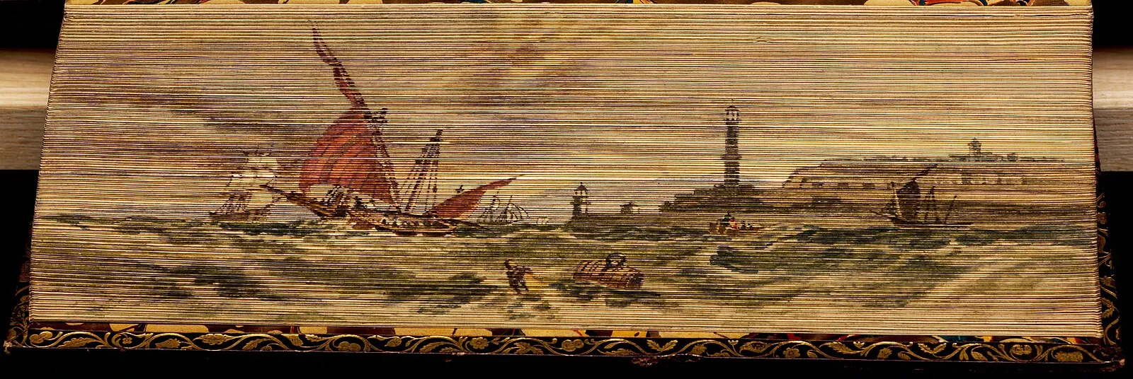 Fore-edge painting of sailing ships entering a Mediterranean harbor