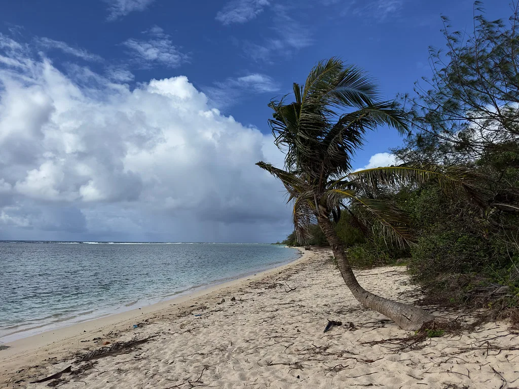 Panoramic view from Two Lovers Point cliff overlooking the turquoise Pacific Ocean in Guam