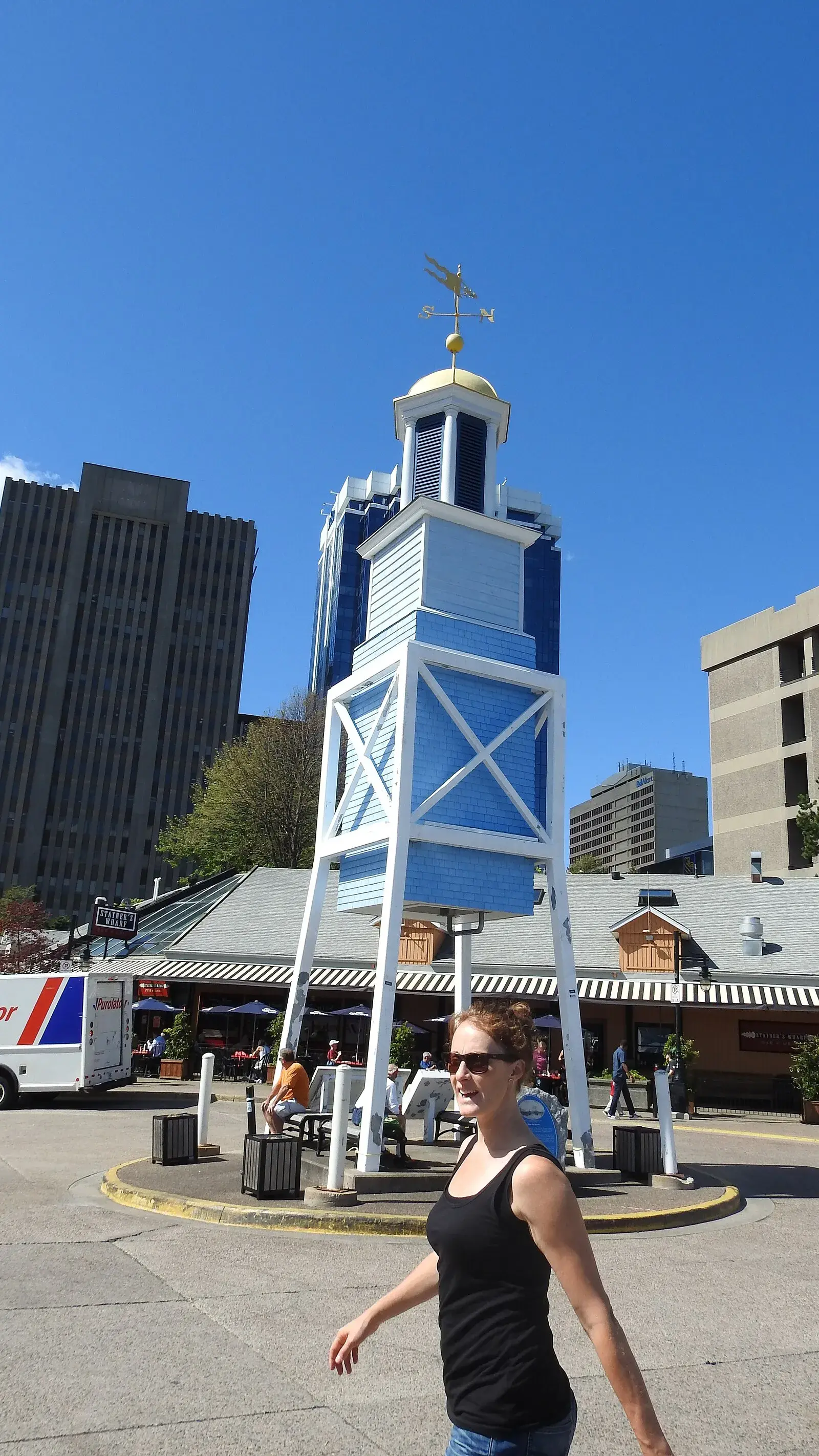 Halifax Brewery Market clock tower with downtown buildings behind