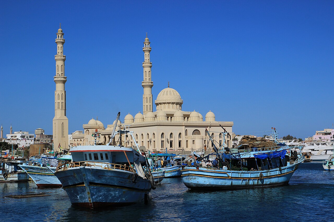 Hurghada port with turquoise Red Sea waters and moored boats along the marina waterfront