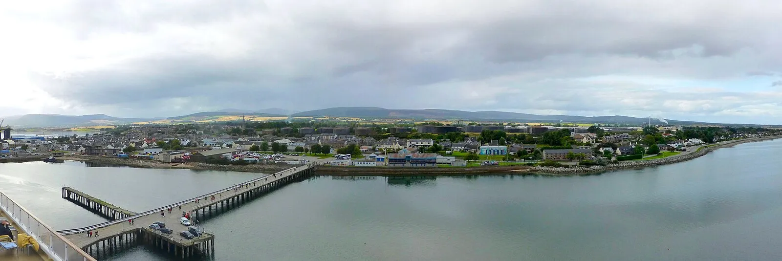 Panoramic of Invergordon from cruise ship showing pier and town