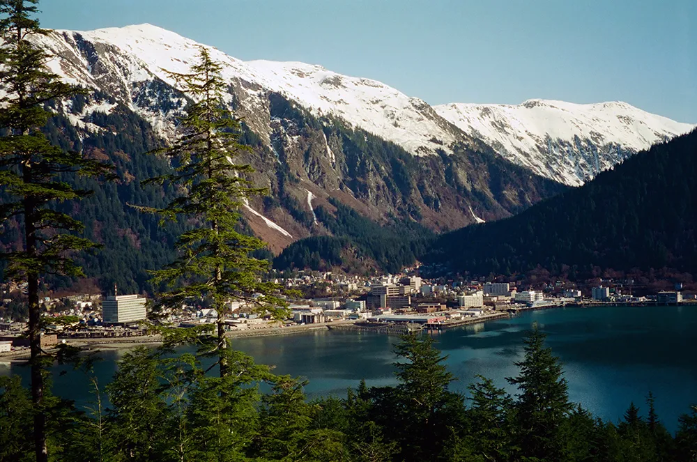 Classic view of Juneau from across Gastineau Channel with snow-capped mountains
