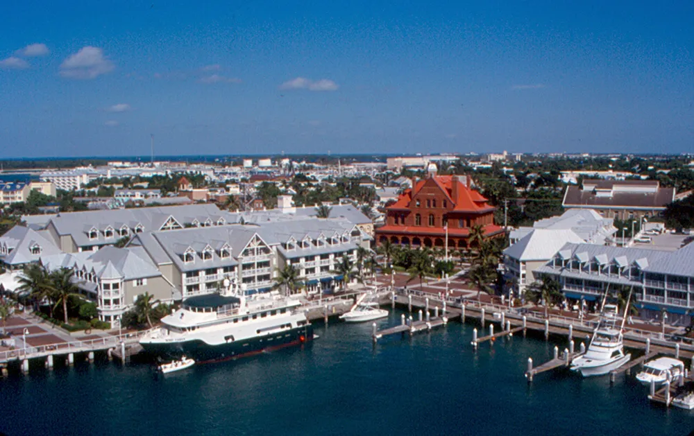 Colorful conch-style houses on a sunny afternoon