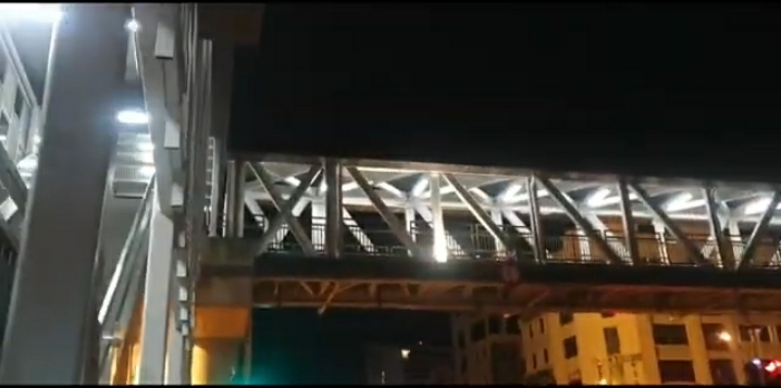 Crystal clear turquoise waters of Tunku Abdul Rahman Marine Park with tropical island and lush green hillside