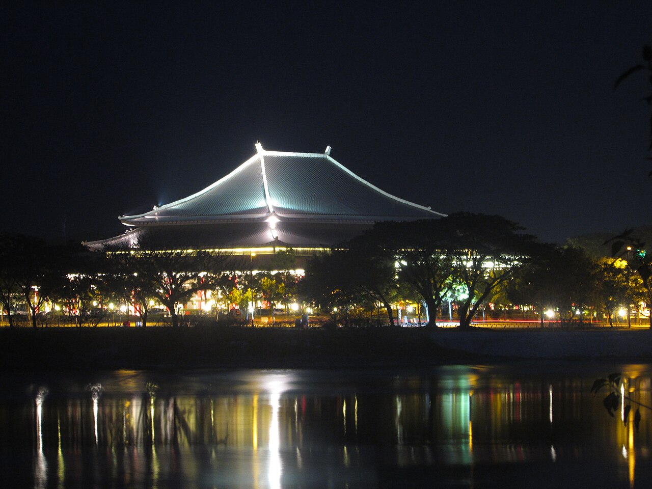Atkinson Clock Tower, one of the few surviving pre-war structures in Kota Kinabalu surrounded by tropical foliage