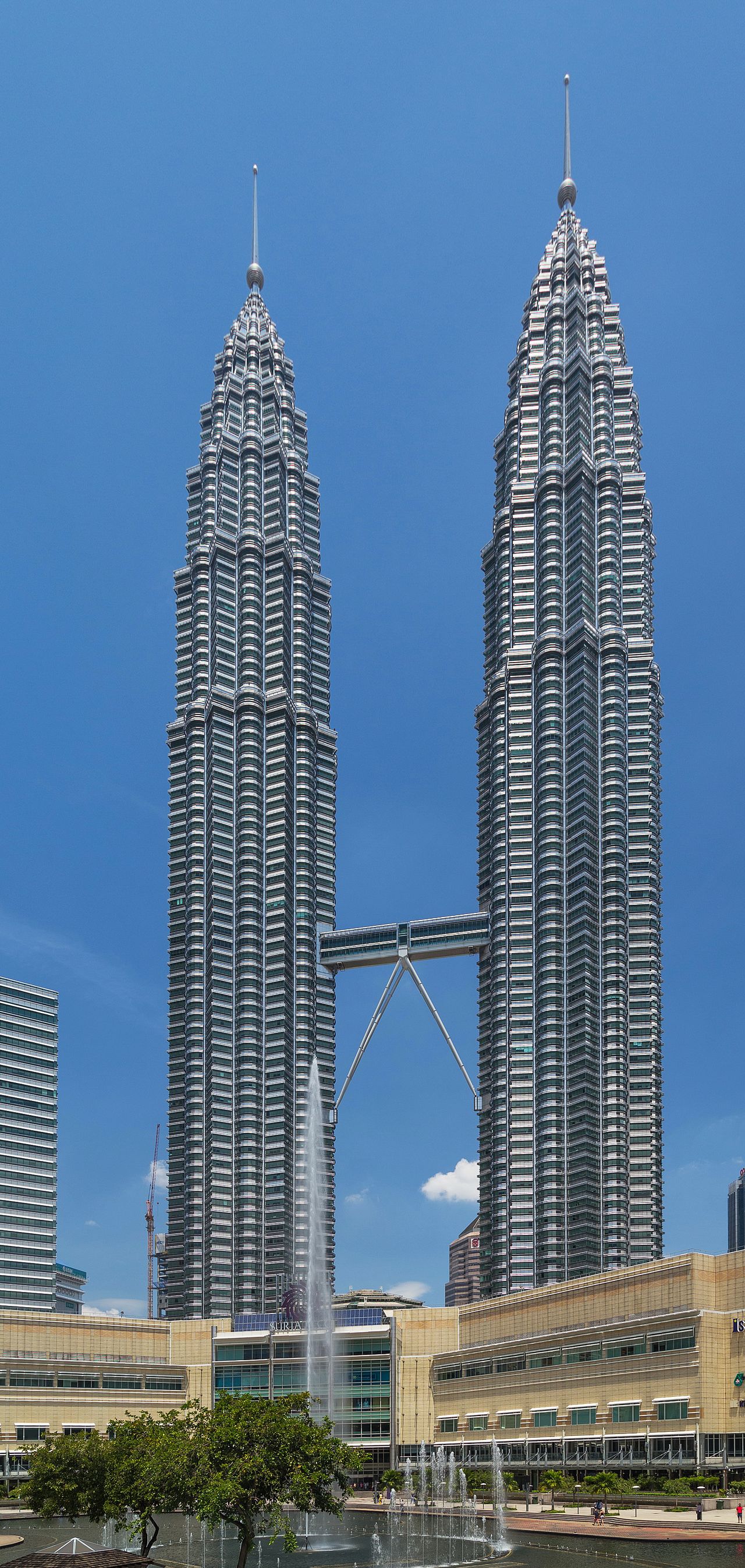 Petronas Twin Towers against a clear blue sky from KLCC park