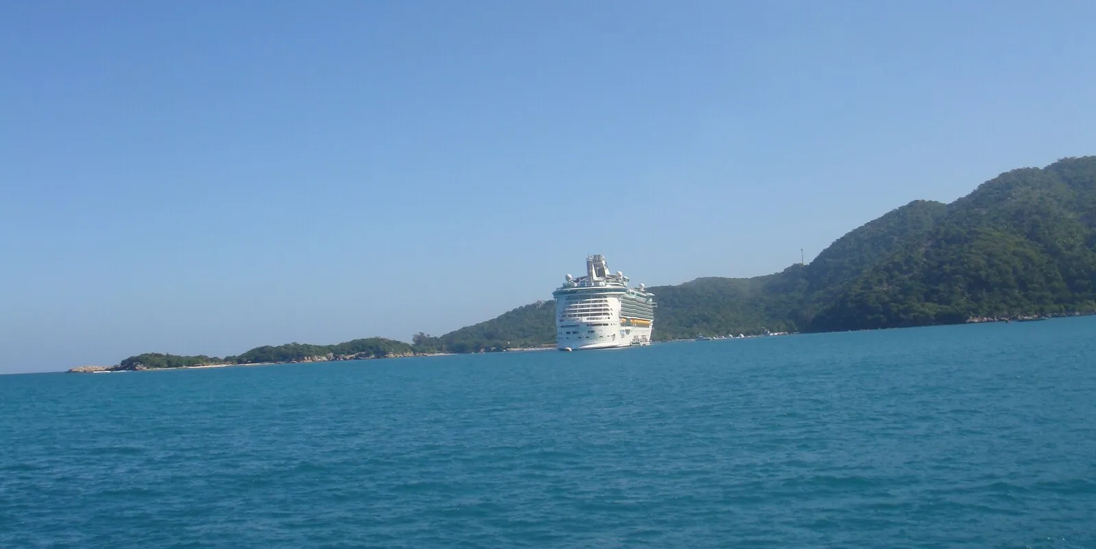 Labadee Haiti coastline with lush green mountains meeting turquoise Caribbean waters