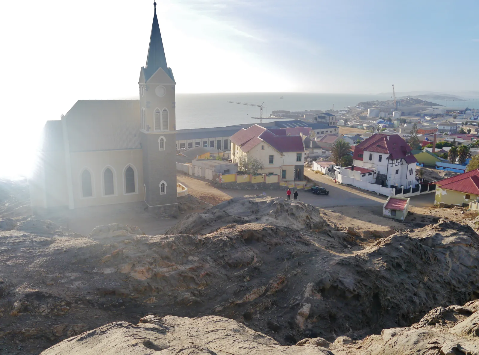The Felsenkirche at Lüderitz standing on its bare rock outcrop above the town, its spire against a clear sky