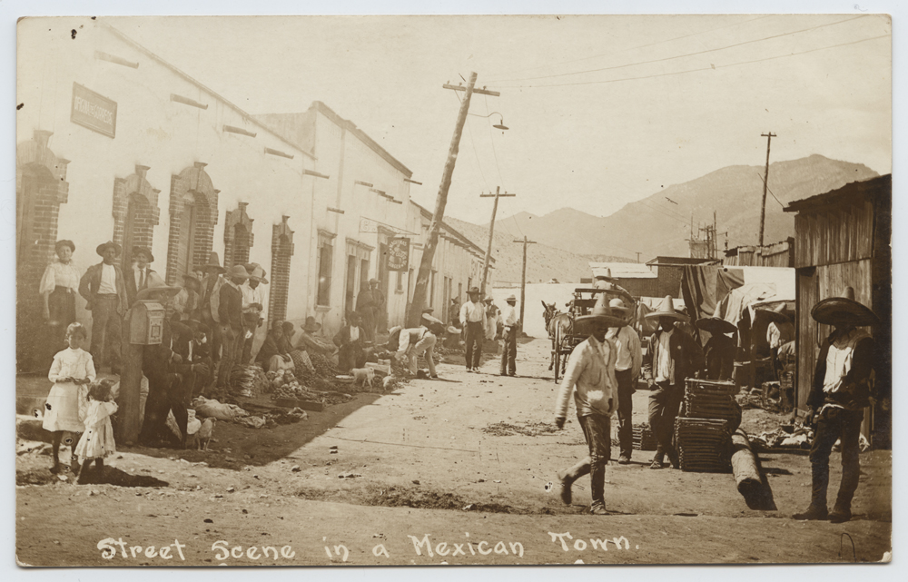 Swimming pool overlooking Santiago Bay at Las Hadas resort with white architecture framing the view