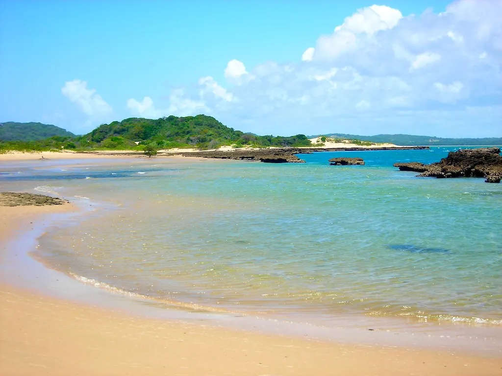 The Indian Ocean coastline south of Maputo showing sandy beaches and turquoise tropical waters