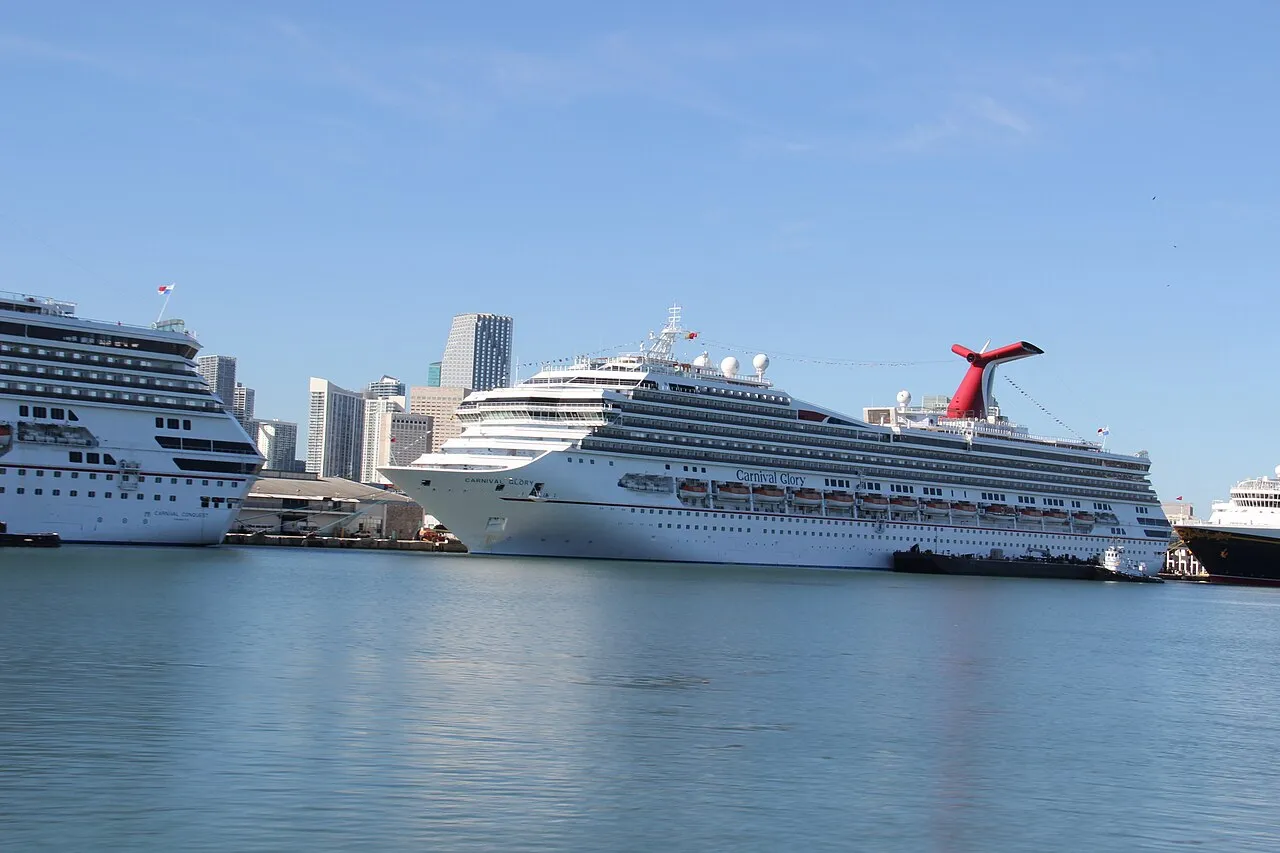 Carnival Glory and Carnival Conquest cruise ships at PortMiami with skyline