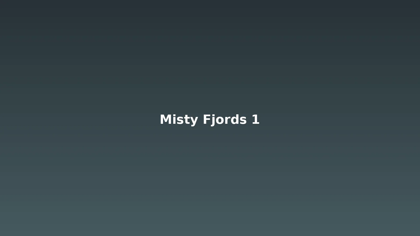 Granite cliffs rising from the waters of Behm Canal