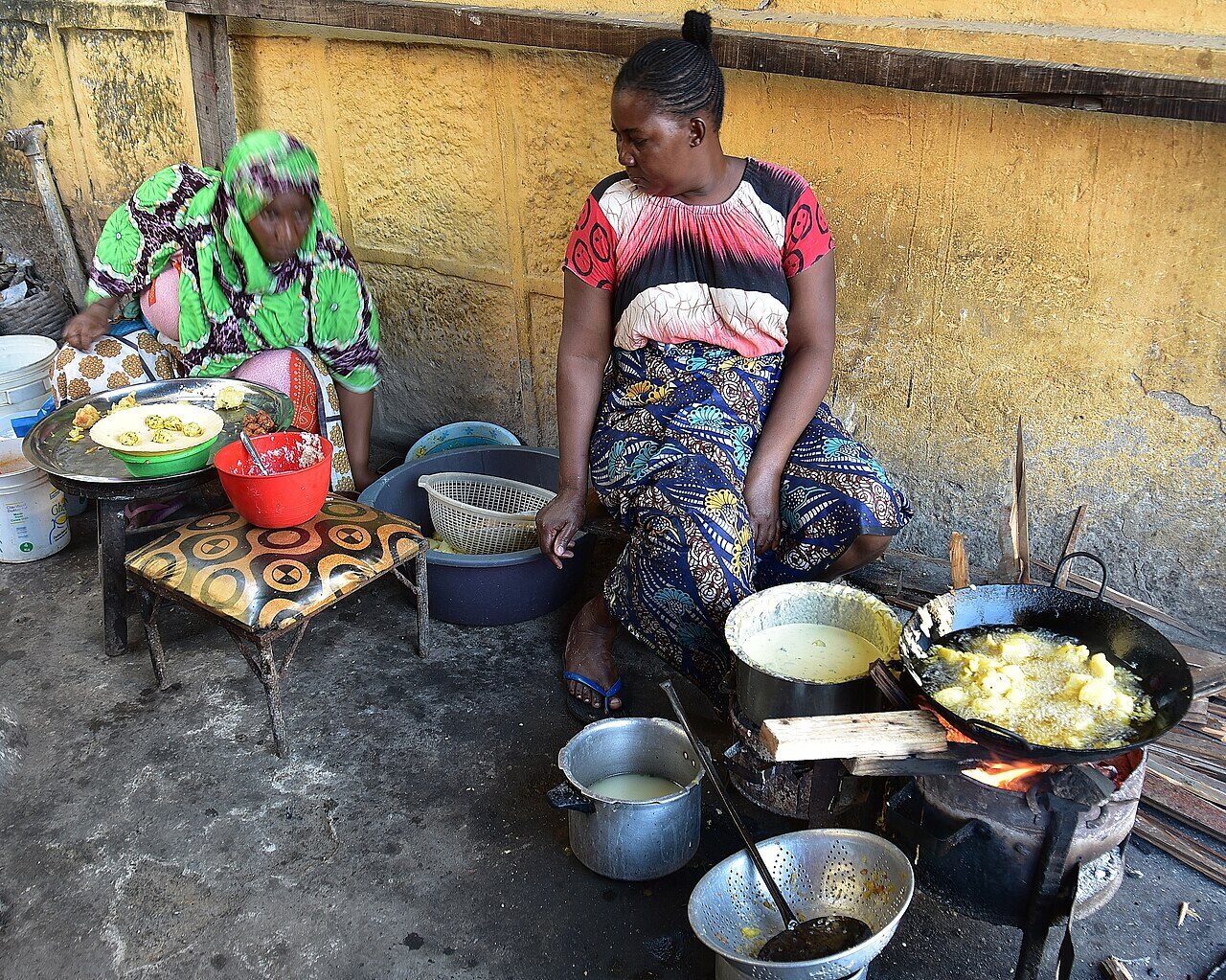 Sizzling Swahili street food being prepared at an open-air stall in Mombasa's city center