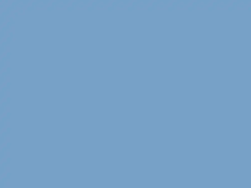 Cobblestone street in Ciudad Vieja with colonial architecture and wrought-iron balconies