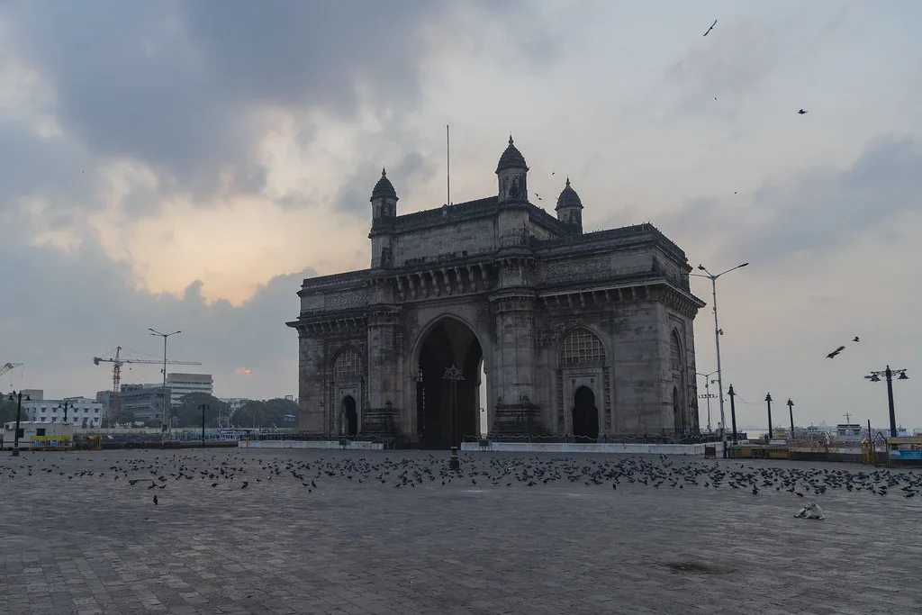 Gateway of India monument and Mumbai harbor waterfront