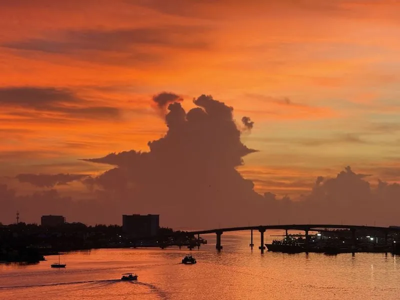 Turquoise Nassau waters meeting tropical Caribbean skies in stunning contrast