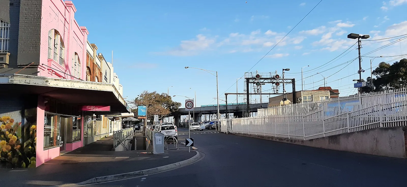Cliff Walk trail winding along the rocky Newport coastline with Atlantic waves crashing below