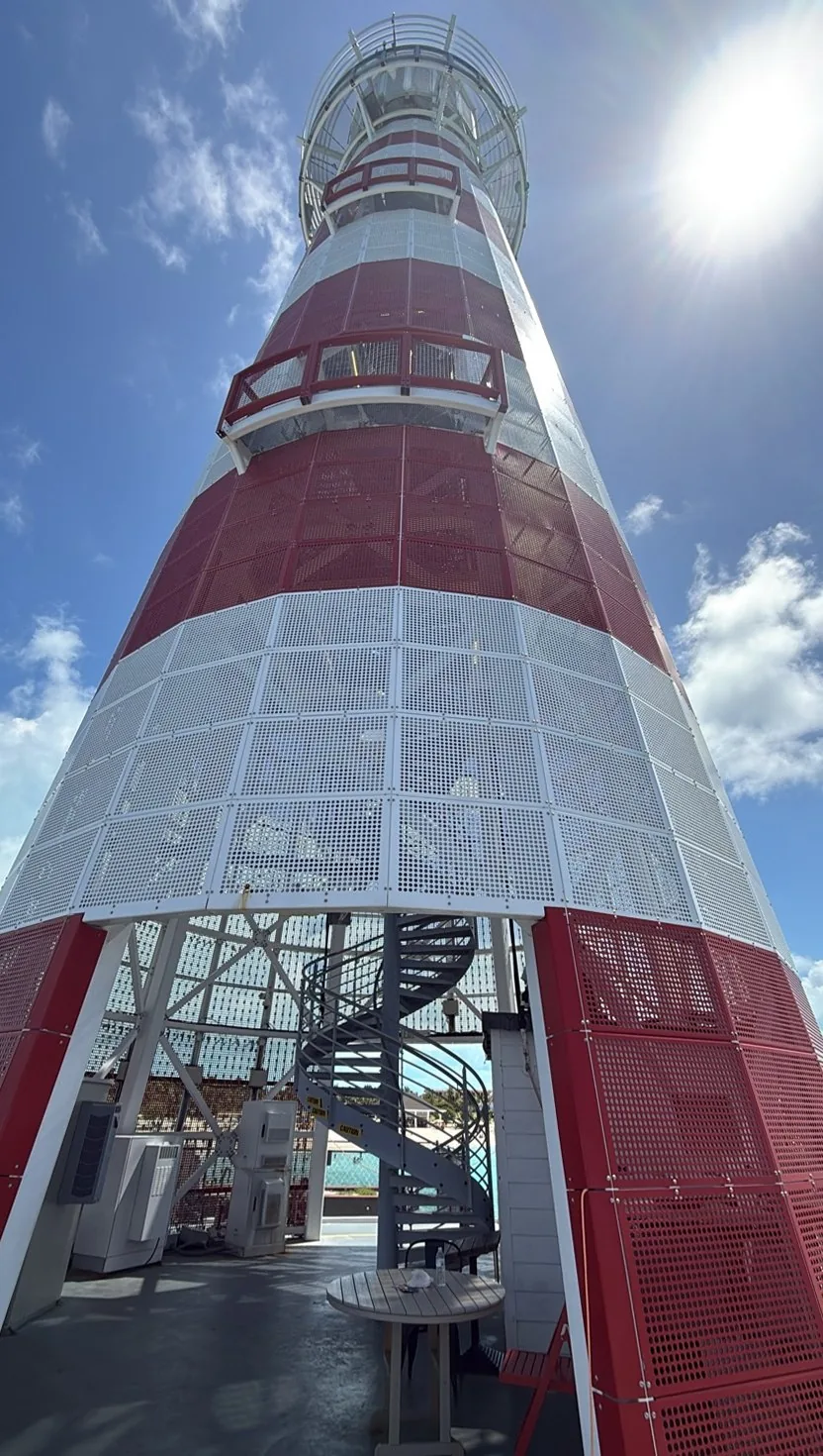 Looking straight up the inside of the Ocean Cay lighthouse from its base, internal spiral staircase visible