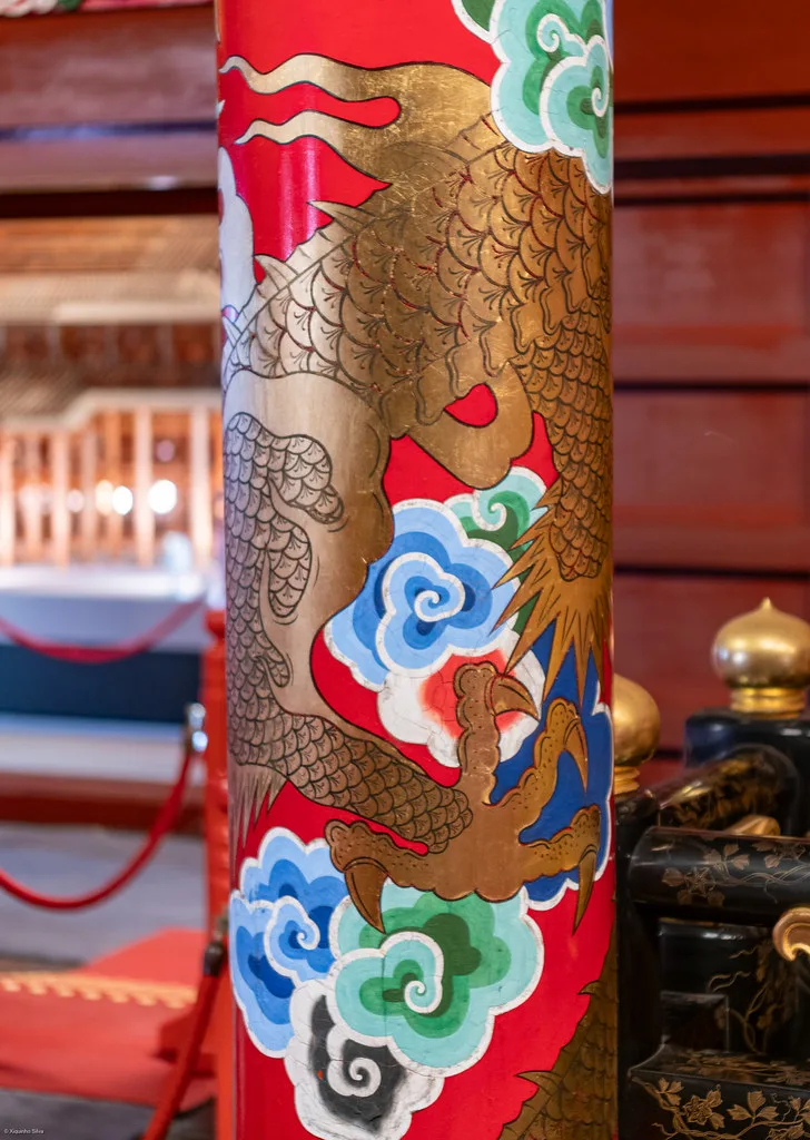Rows of black granite memorial stones at the Cornerstone of Peace in Mabuni overlooking the sea