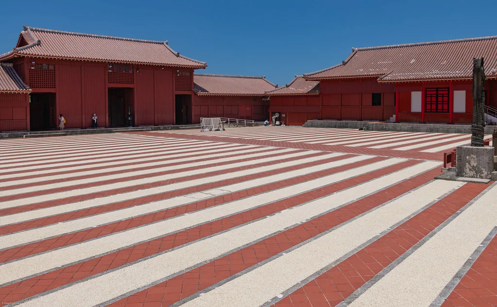 Shureimon gate at Shuri Castle with traditional Ryukyu architecture and red-tiled rooftop in Naha