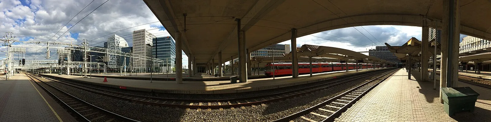 Oslo Central Station platforms with modern architecture and Barcode buildings