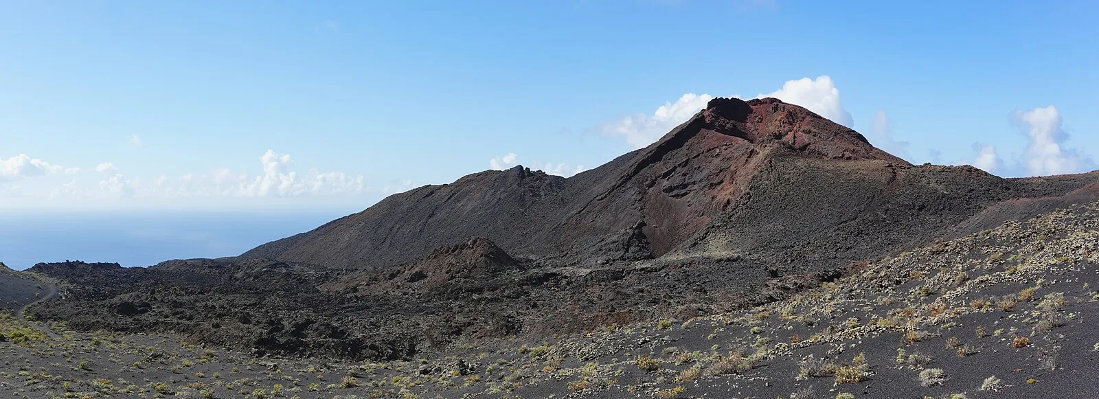 Traditional ensaimada pastry dusted with powdered sugar at a Palma bakery