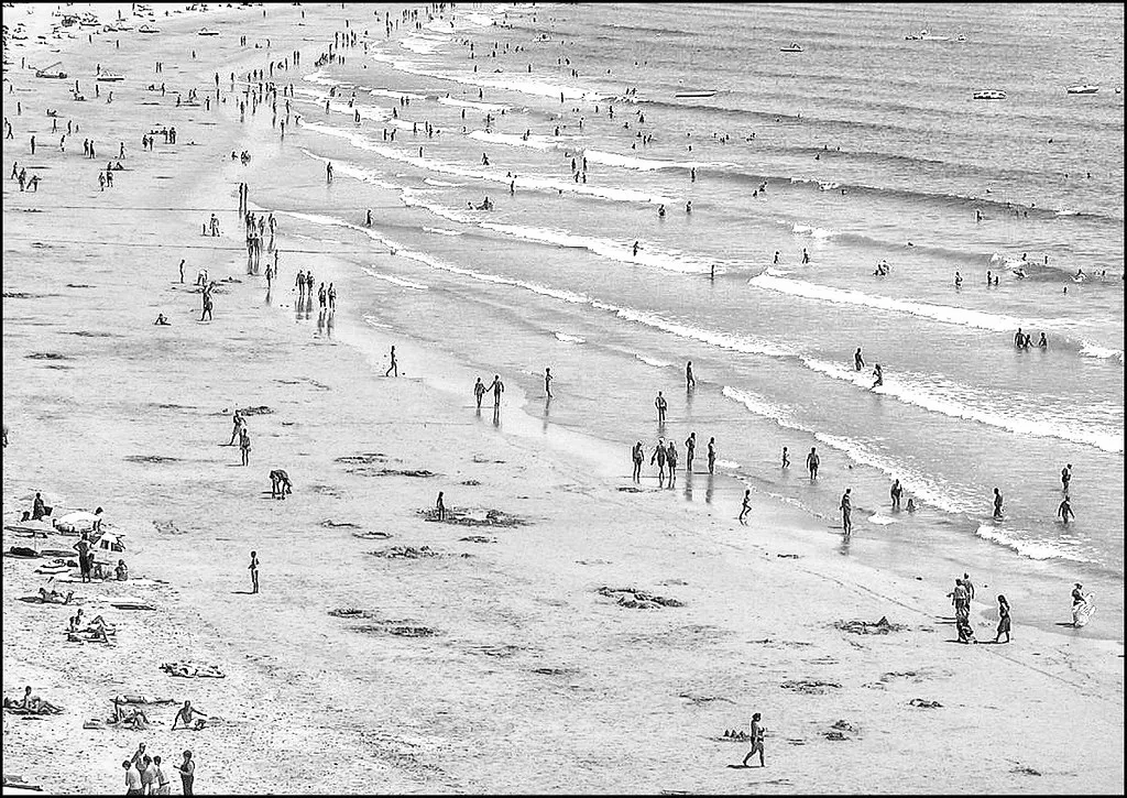 Narrow cobblestone street in Portimão old town with colorful Portuguese buildings