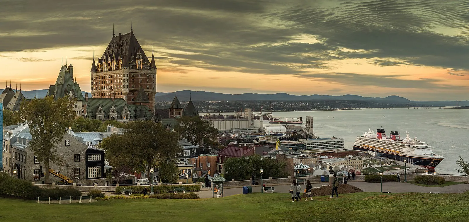 Sunset panorama of Château Frontenac, Old Quebec, and Disney cruise ship at port